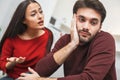 Young couple having romantic evening at home misunderstanding Royalty Free Stock Photo