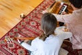 People playing classical guitar and harmonium