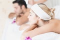 Young man and woman relaxing in a clean spa salon. Young beauty healthy female and young man resting in the spa salon Royalty Free Stock Photo