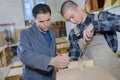 Young men in woodworking room