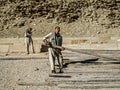 Young Men Working on the Pyramids