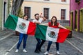 Young mexican soccer fans holding flags in Mexico Royalty Free Stock Photo