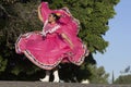 A young mexican woman folk dancer with traditional costume