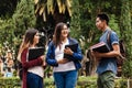 Young mexican woman in group of Latin students in university in Latin America