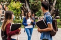 Young mexican woman in group of Latin students in university in Latin America