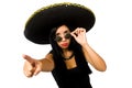 The young mexican woman wearing sombrero isolated on white Royalty Free Stock Photo