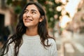 Young middle east girl smiling happy standing at the city