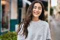 Young middle east girl smiling happy standing at the city