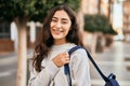 Young middle east student girl smiling happy standing at the city Royalty Free Stock Photo