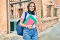 Young middle east student girl smiling happy walking at the university campus Royalty Free Stock Photo