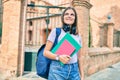 Young middle east student girl smiling happy walking at the university campus Royalty Free Stock Photo