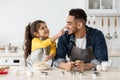 Young Middle Eastern Dad And Little Daughter Having Fun Together In Kitchen Royalty Free Stock Photo