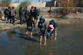 Young migrants crossing the border