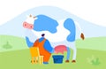 Young Milkmaid Man Character in Uniform Sitting on Chair and Milking Cow into Bucket. Milk and Dairy Farmer Royalty Free Stock Photo