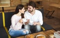 Young millennial couple amorously looking at each other Royalty Free Stock Photo