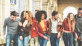 Young millennials friends walking in city old town center - Happy people having fun together - Youth lifestyle, erasmus and