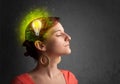 Young mind thinking of green eco energy with lightbulb Royalty Free Stock Photo