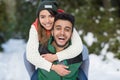 Young Mix Race Couple Snow Forest Outdoor Winter Walk Royalty Free Stock Photo