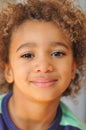 Young mixed race boy with curly hair Royalty Free Stock Photo