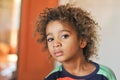Young mixed race boy with curly hair Royalty Free Stock Photo