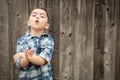 Young Mixed Race Boy Making Hand Gestures Royalty Free Stock Photo