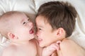 Mixed Race Chinese and Caucasian Baby Brothers Having Fun Laying