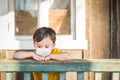 Young Mixed Race Chinese and Caucasian Boy Playing Alone Wearing Medical Face Mask Outside Royalty Free Stock Photo