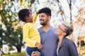 Young mixed race couple spending time with their daughter having fun Royalty Free Stock Photo