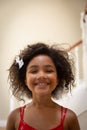 Young mixed race girl smiling to camera Royalty Free Stock Photo