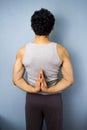 Young mixed race man in yoga pose