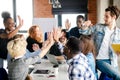 Young mixed race people comparing their hands Royalty Free Stock Photo