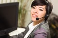 Young Mixed Race Woman Smiles Wearing Headset Royalty Free Stock Photo