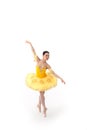 Young modern ballet dancer in yellow dress isolated on white background Royalty Free Stock Photo