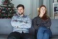 Young modern couple is irritated of christmas