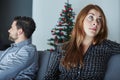 Young modern couple is irritated of christmas
