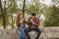 Attractive couple refreshing in the park Royalty Free Stock Photo