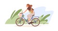 Young modern woman riding bicycle with basket. Happy cyclist on bike with grocery net bag in nature. Eco-friendly Royalty Free Stock Photo