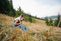 Young mom with baby boy travelling. Mother on hiking adventure with child, family trip in mountains. National Park. Hike with Royalty Free Stock Photo