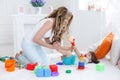 Young mom with her child play together Royalty Free Stock Photo