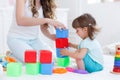 Young mom with her child play together Royalty Free Stock Photo