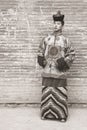 Young man in an old Mongolian costume.