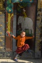 Young monk at the buddhist monastery of Bodhnath on Nepal Royalty Free Stock Photo