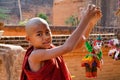 A young monk playing the puppets in Bagan, Myanmar Royalty Free Stock Photo