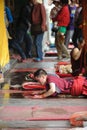 Young monk praying