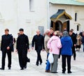 Young monks walk in Trinity Sergius Lavra