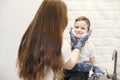 Mother and child son cleaning dishes together Royalty Free Stock Photo