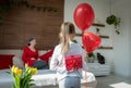 Young mother, cancer patient, and her cute daughter, celebrating return home from hospital. Welcome home or birthday party. Royalty Free Stock Photo