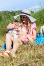 A young mother with a child outdoors Royalty Free Stock Photo