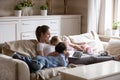 Young mother and children using pc have fun at home Royalty Free Stock Photo