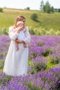 Young mother cradling her little baby in her arms Royalty Free Stock Photo